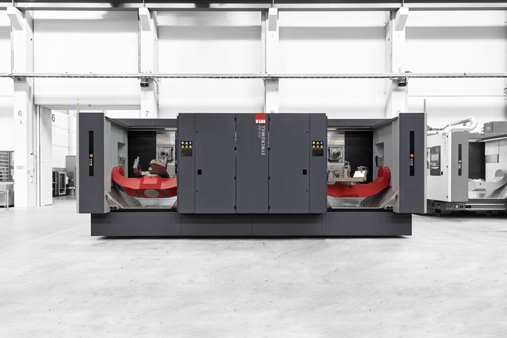 © Fill Maschinenbau Syncromill D, die nächste Generation: Das Bearbeitungszentrum von Fill ermöglicht die Bearbeitung von großen Strukturbauteilen auf engstem Raum. Syncromill D, die nächste Generation: Das Bearbeitungszentrum von Fill ermöglicht die Bearbeitung von großen Strukturbauteilen auf engstem Raum.