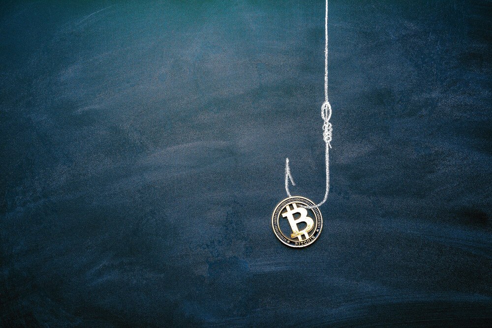 © Velishchuk / iStock / Getty Images Plus via GettyImages Krypto-Währung-Finanzbetrug