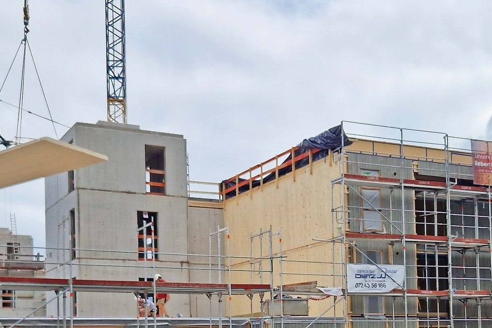 © proHolz Salzburg // Holz-Beton-Hybridbauweise bei einem mehrgeschoßigen Wohnbau Holz-Beton-Hybridbauweise bei einem mehrgeschoßigen Wohnbau