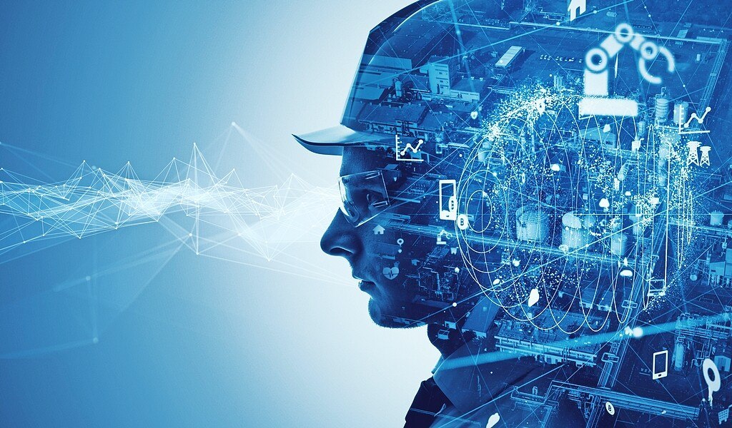 © Getty Images / metamorworks Fotomontage Mensch mit Bauhelm und Digitalisierung