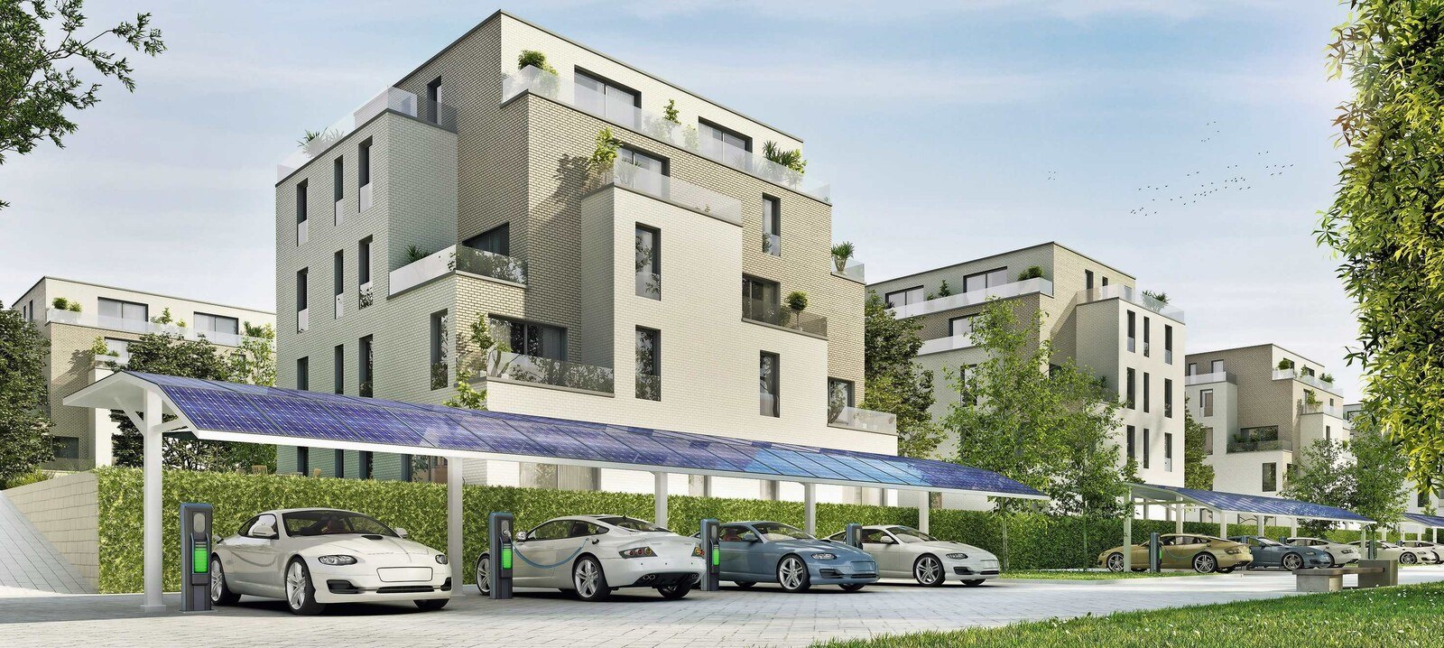 Wohnanlage mit Parkplatz für E-Autos