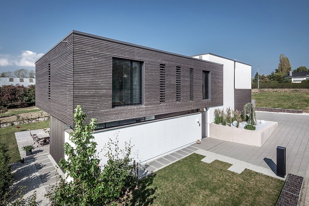 Vorvergrauung einer Holzfassade