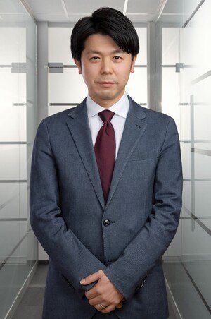 Portrait von Mitsuru Masunaga, geschäftsführender Vizepräsident der Kansai Helios Gruppe