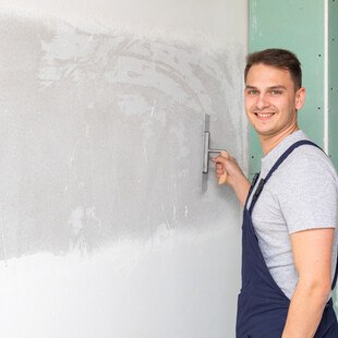 Maler und Anstreicher bei der Arbeit